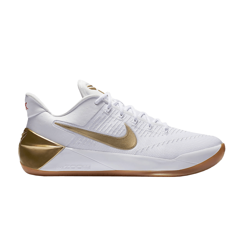 white and gold kobe shoes