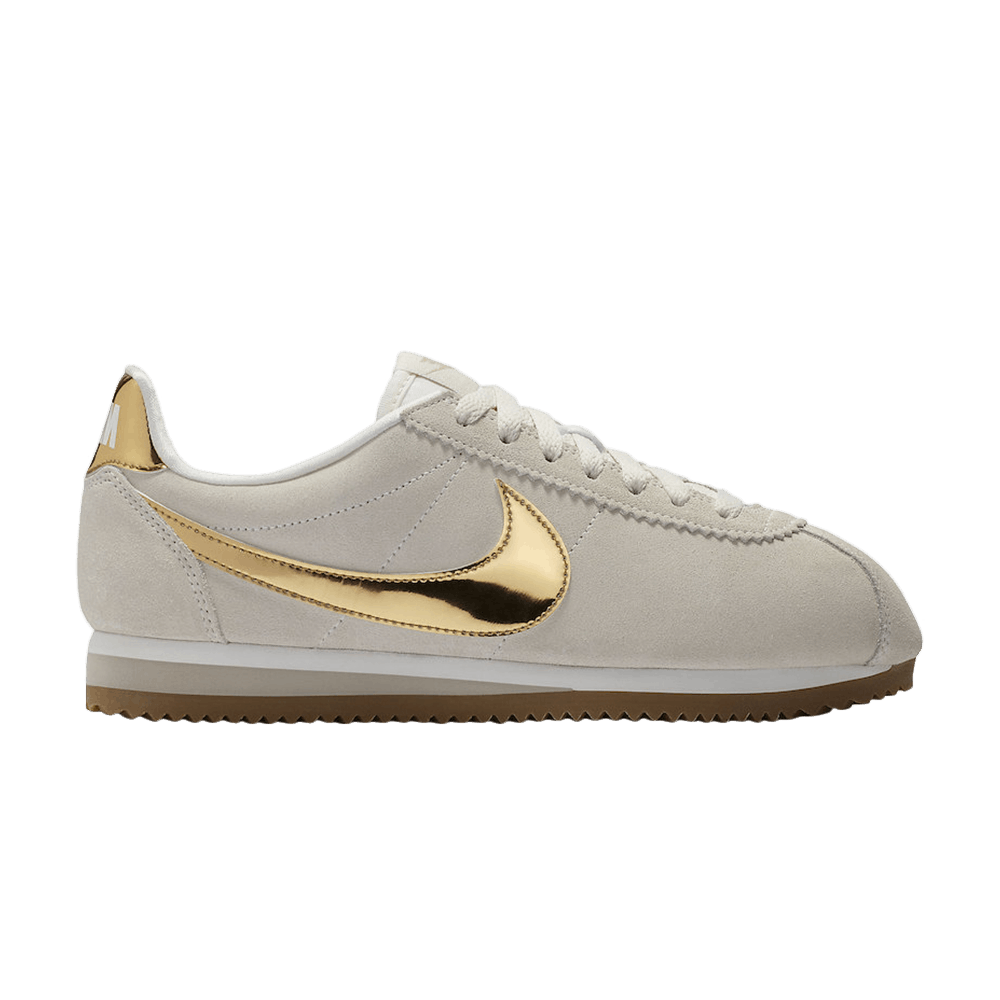 nike black and gold cortez