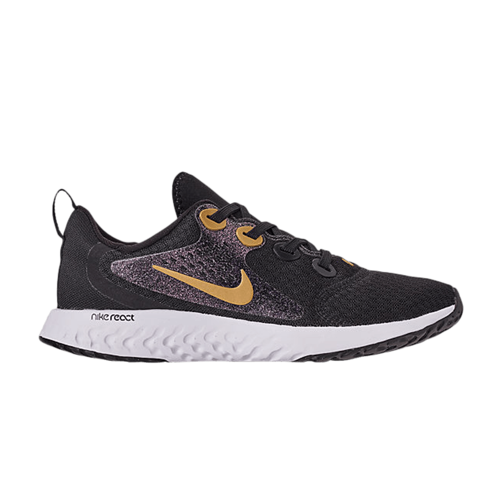 nike running legend react trainers in black and gold