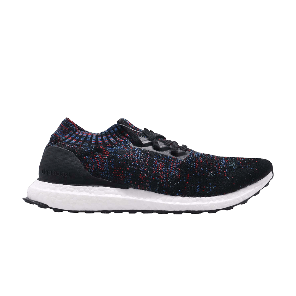 ultra boost uncaged core black active red