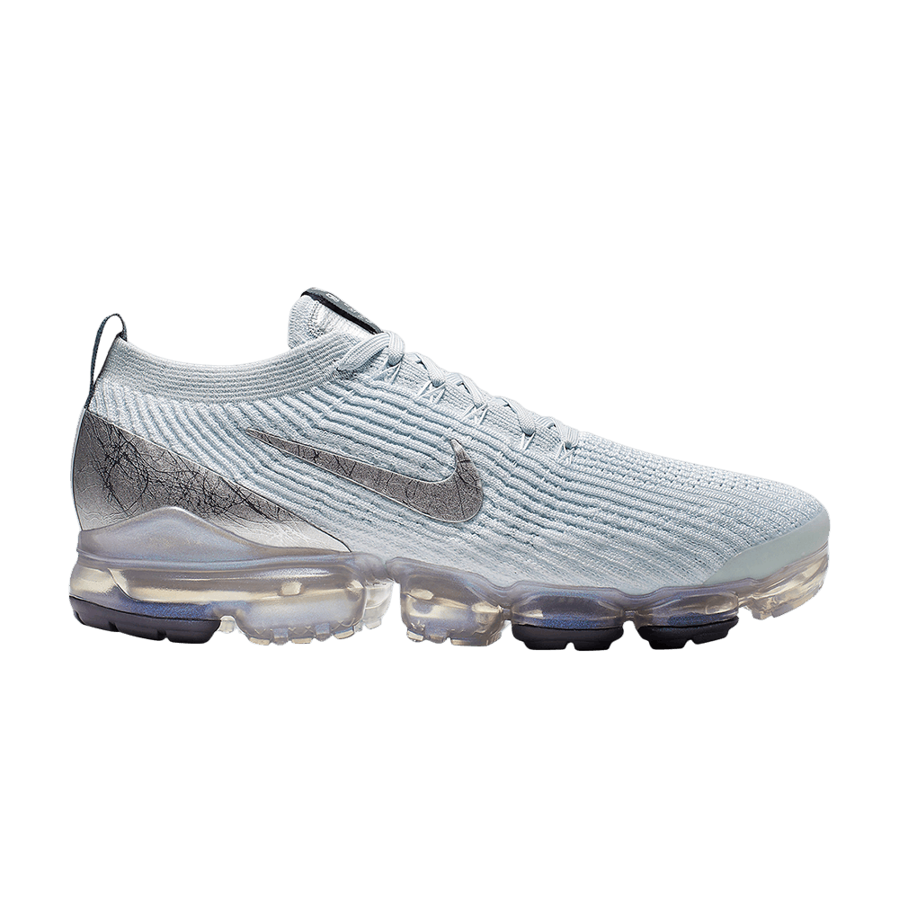 silver and white vapormax