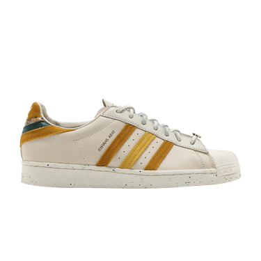 Adidas superstars gold stripes store