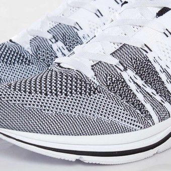 Nike flyknit trainer hot sale black white