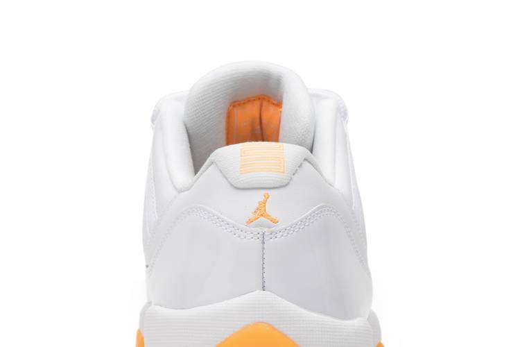 orange and white jordan 11 low