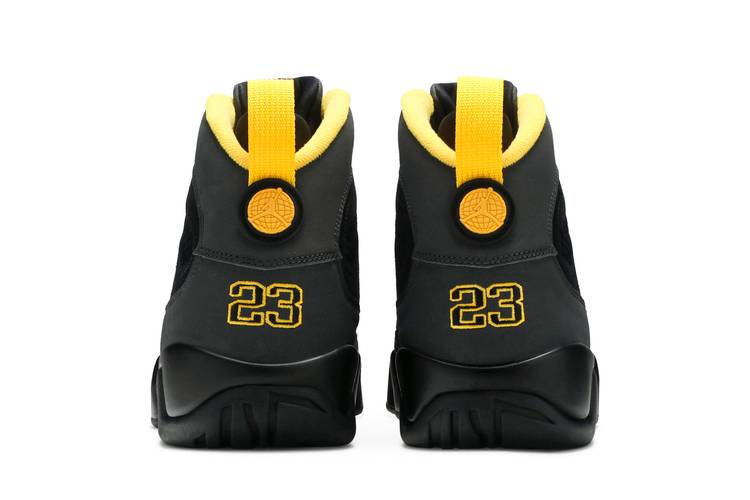 black and yellow jordan 9s