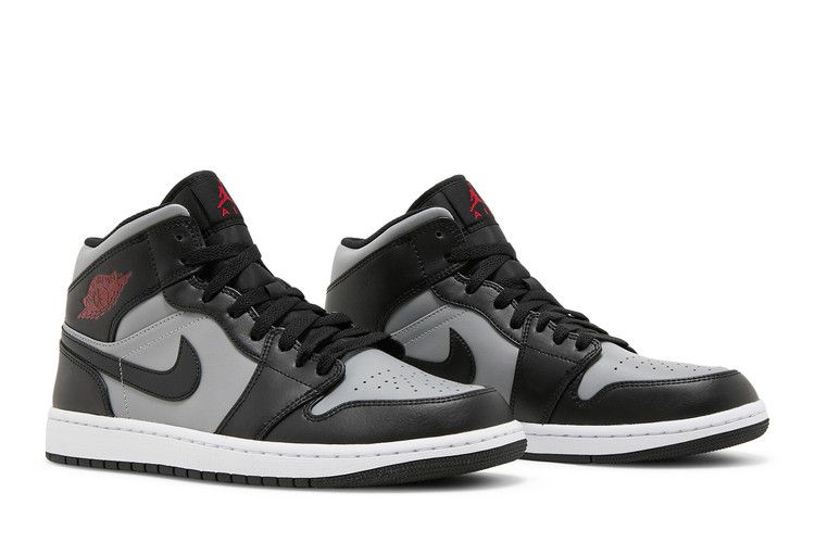 This Shadow-Like Air Jordan 1 Mid Features Red Accents