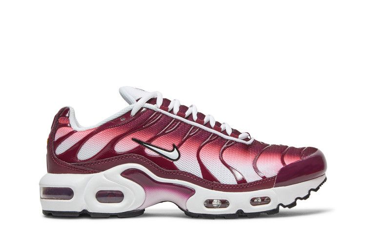 pink and white nike tns