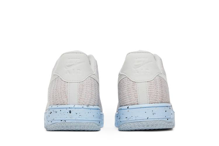 This Nike Air Force 1 Ultra Flyknit Low Features Subtle Glacier Blue  Detailing •