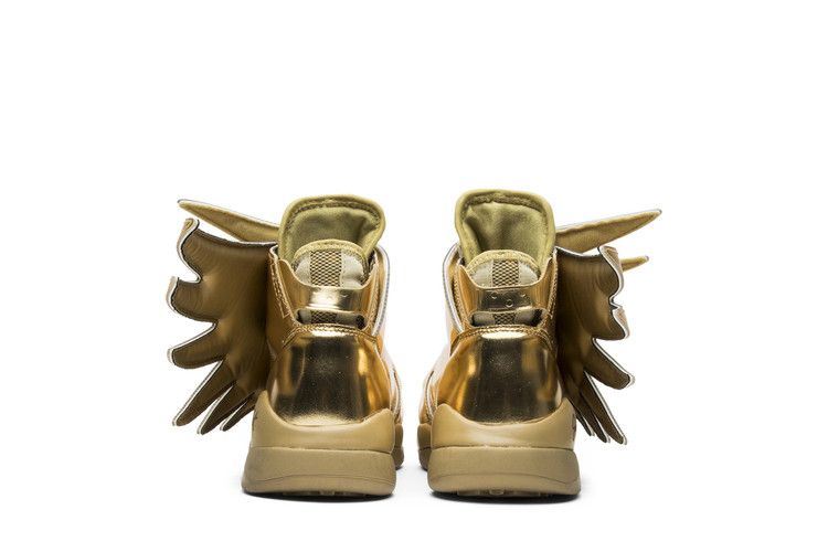 Gold adidas best sale with wings