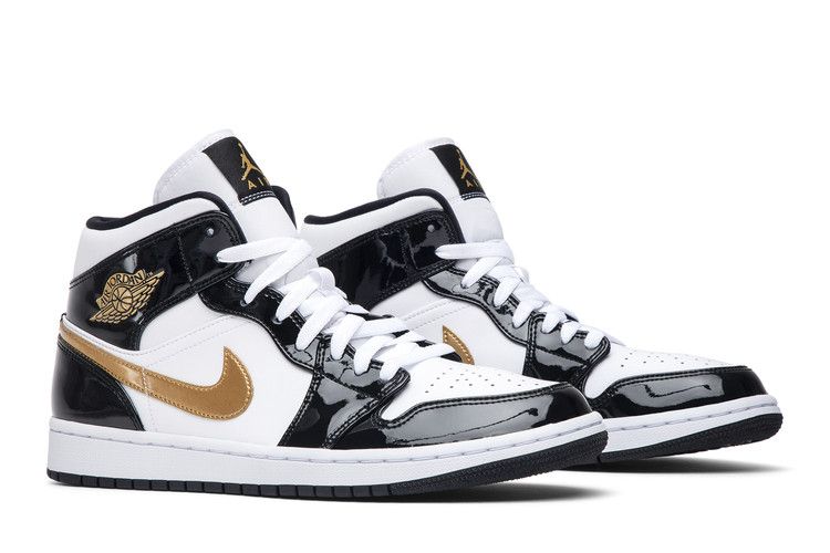 Gold black and white hotsell jordan 1s