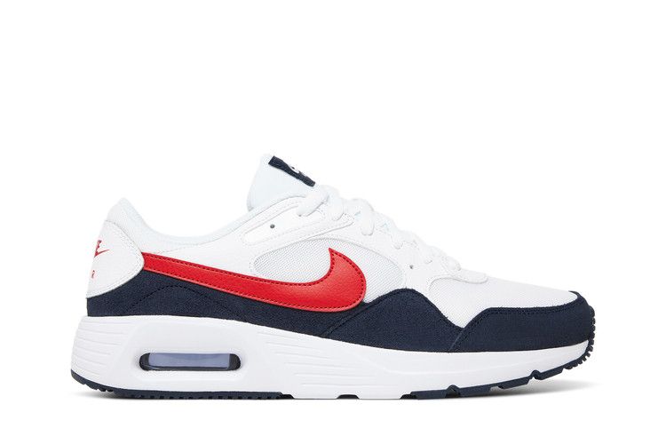 white nike trainers with red tick