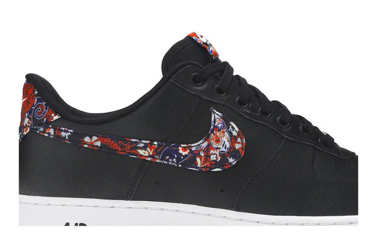 Black nikes with floral swoosh online