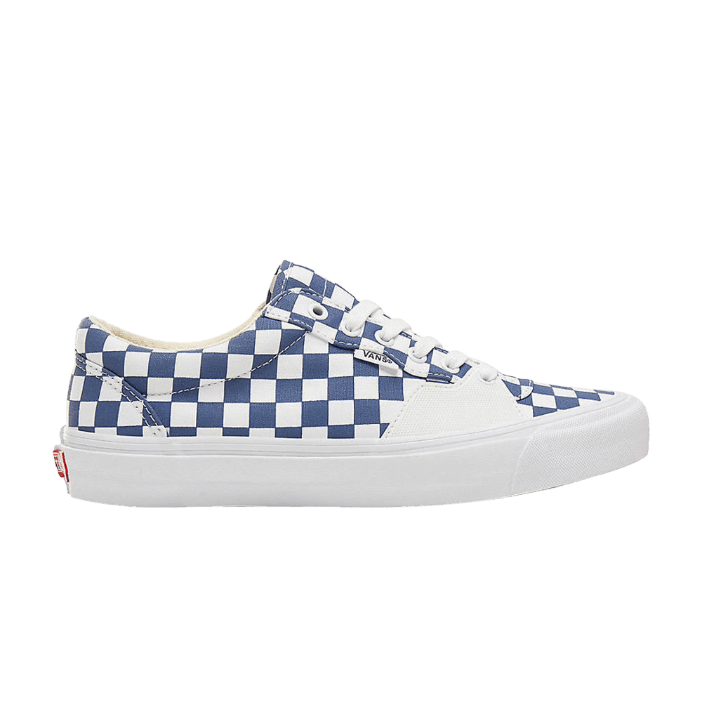 navy checkerboard slip on vans