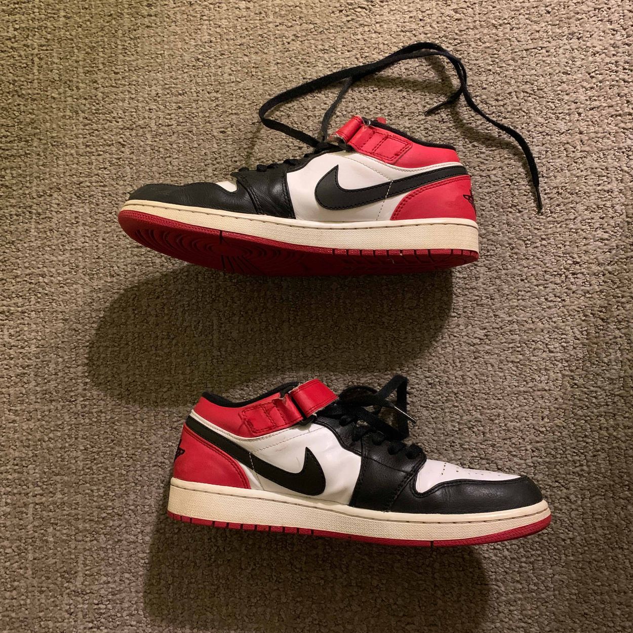 black jordans with a strap