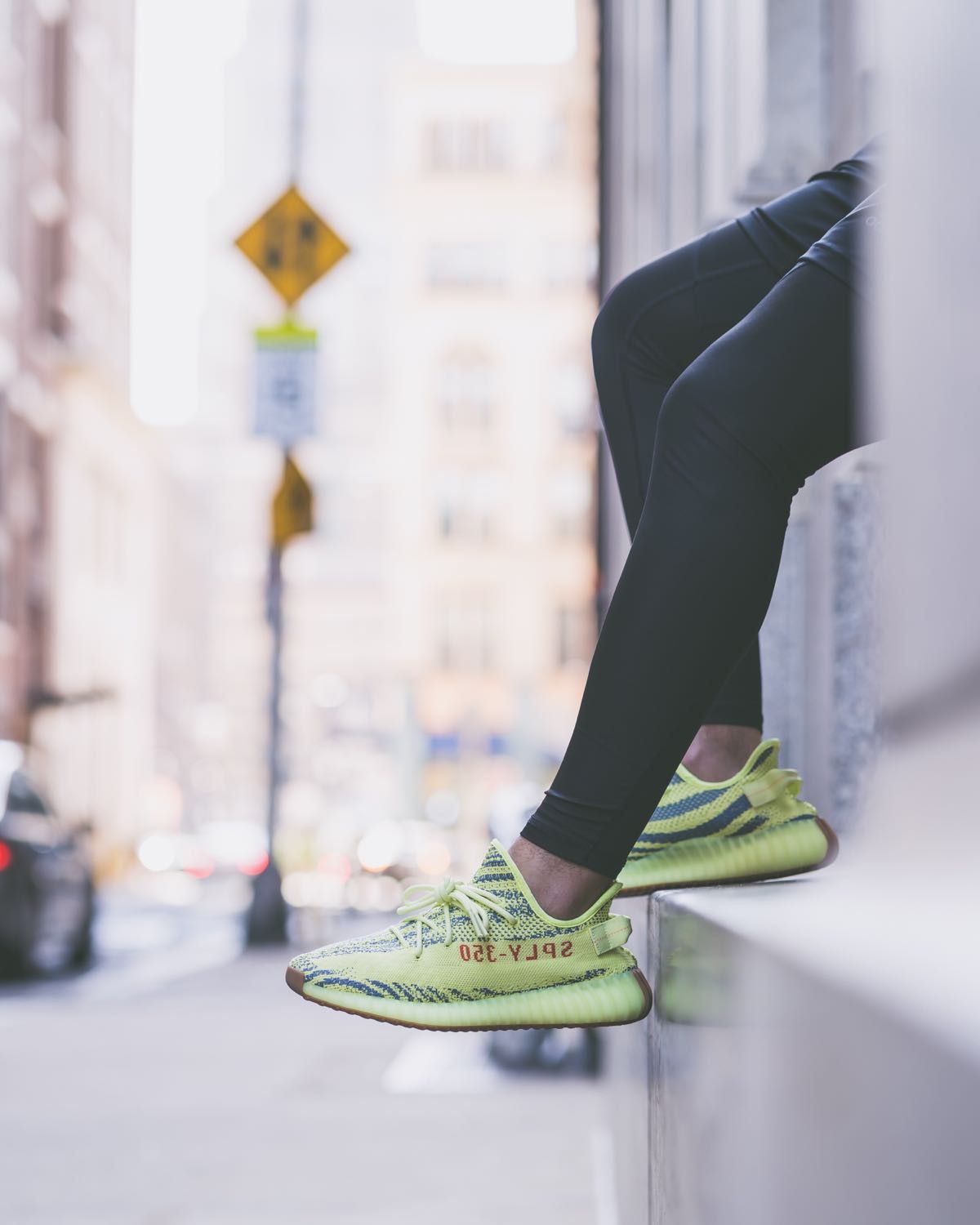 frozen yellow yeezys on feet