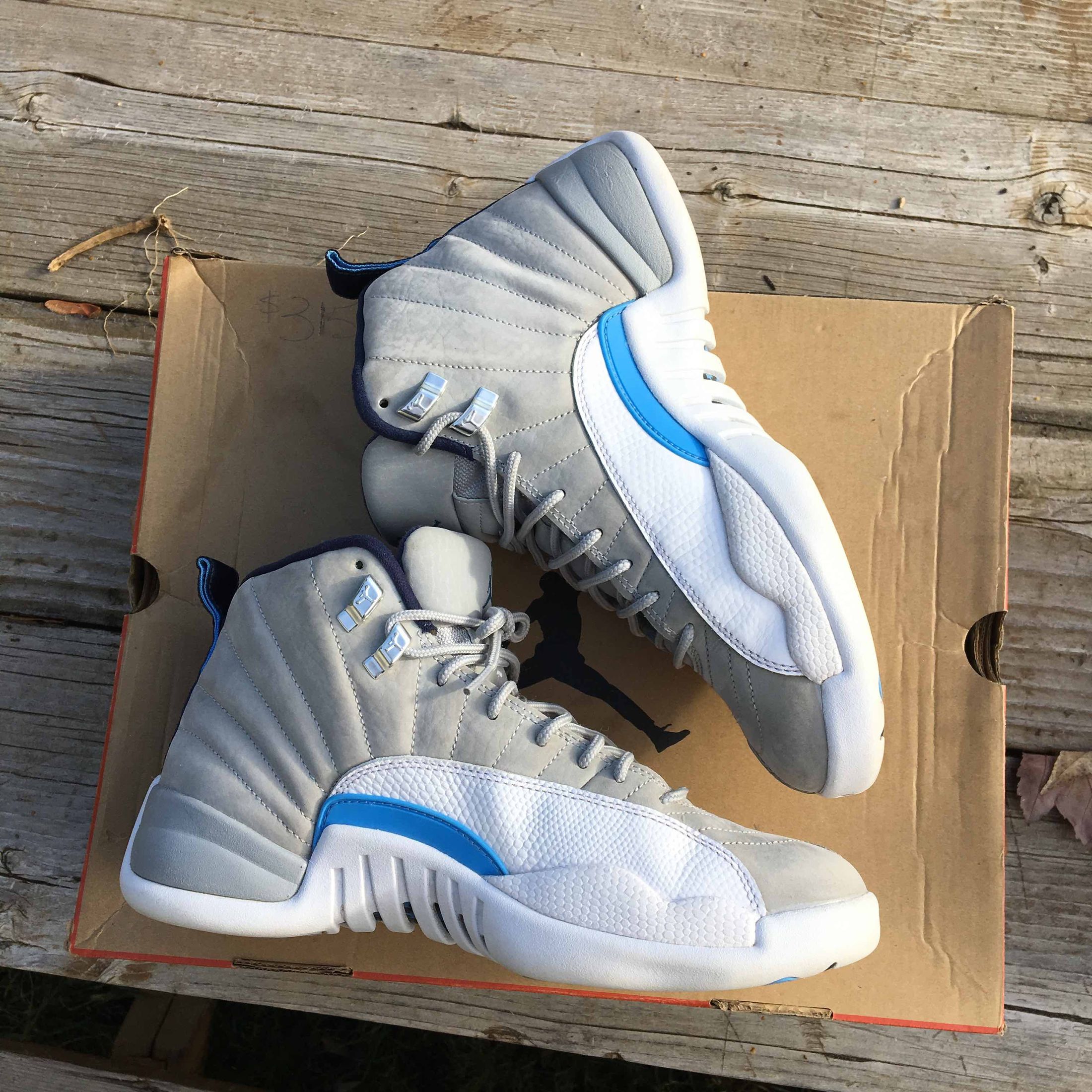 university blue 1s goat