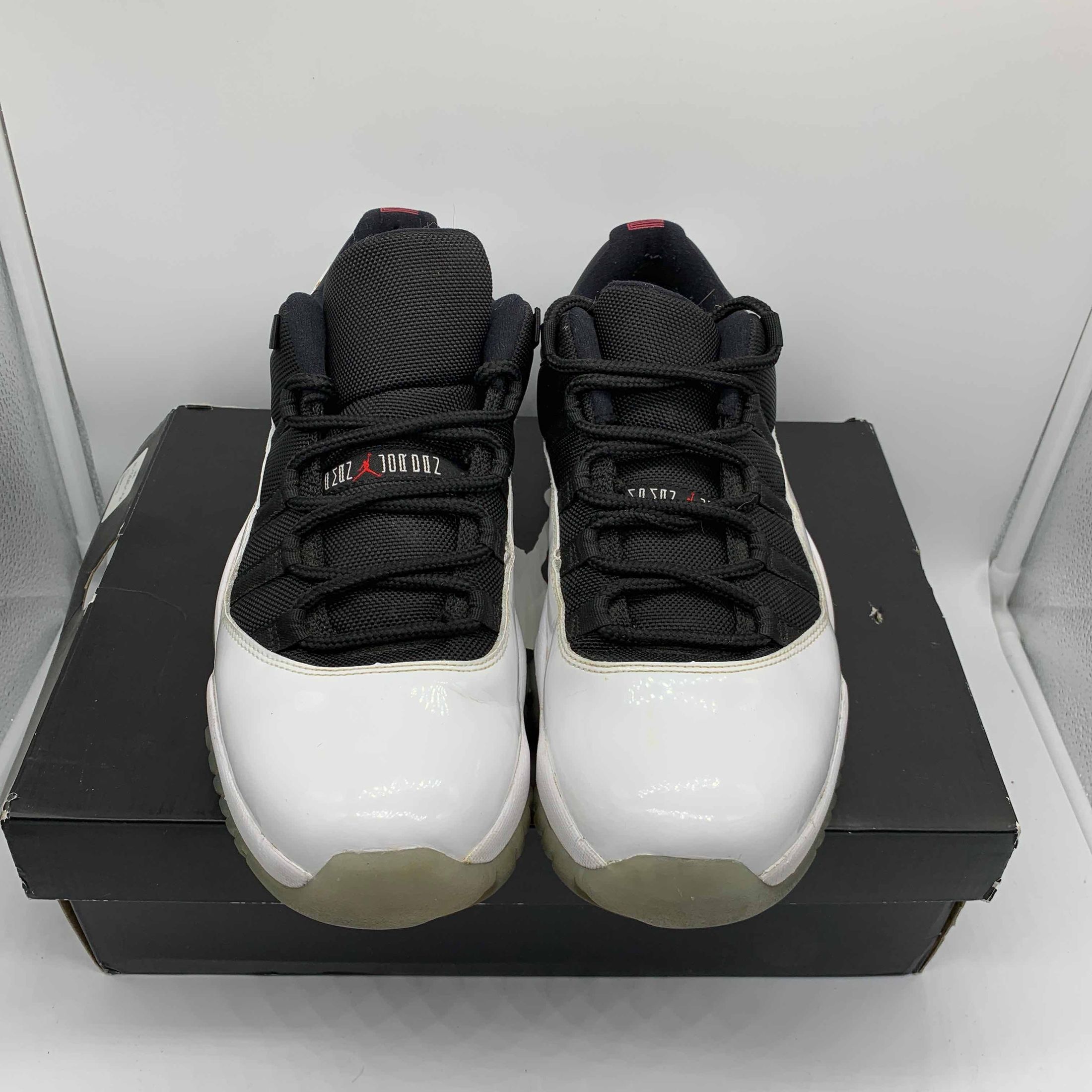jordan 11 low tuxedo