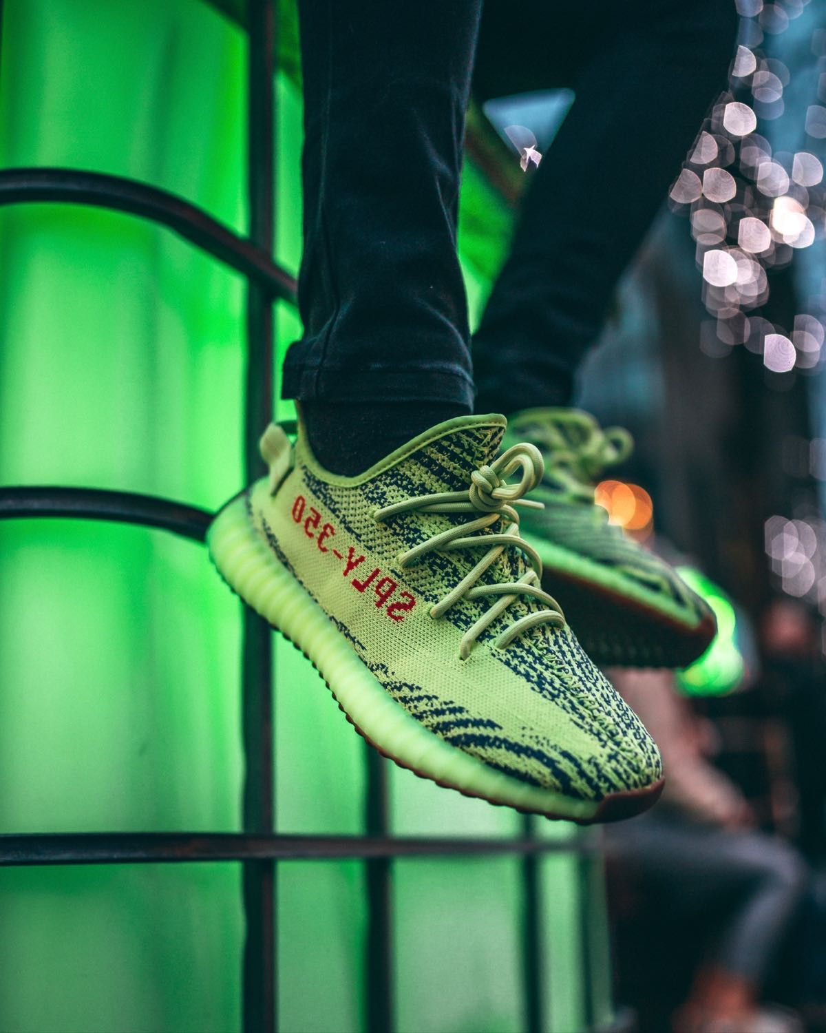 frozen yellow yeezys on feet