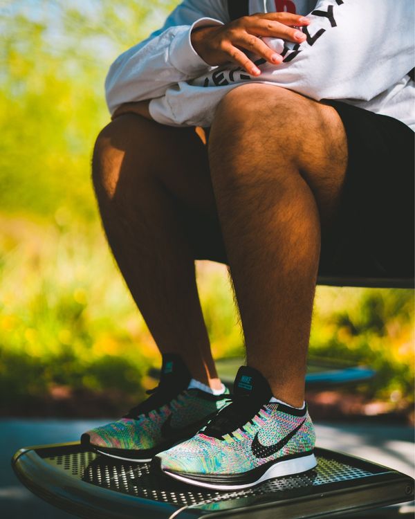 flyknit racer on feet