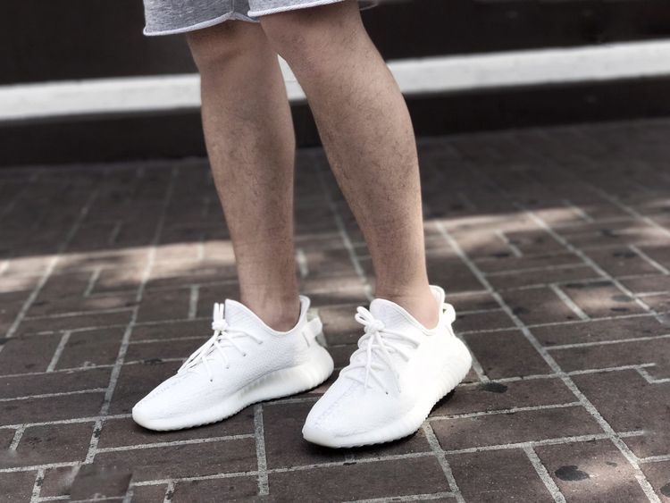 yeezy creams on feet