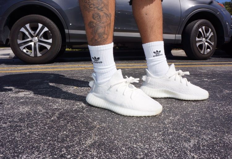 yeezy triple white on feet
