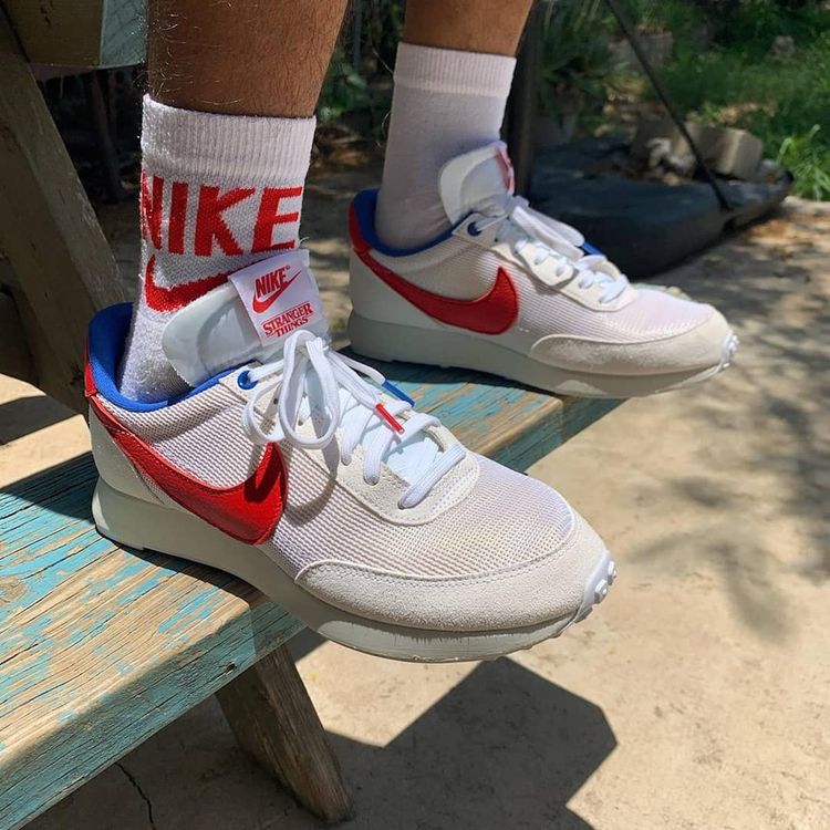 nike tailwind purple