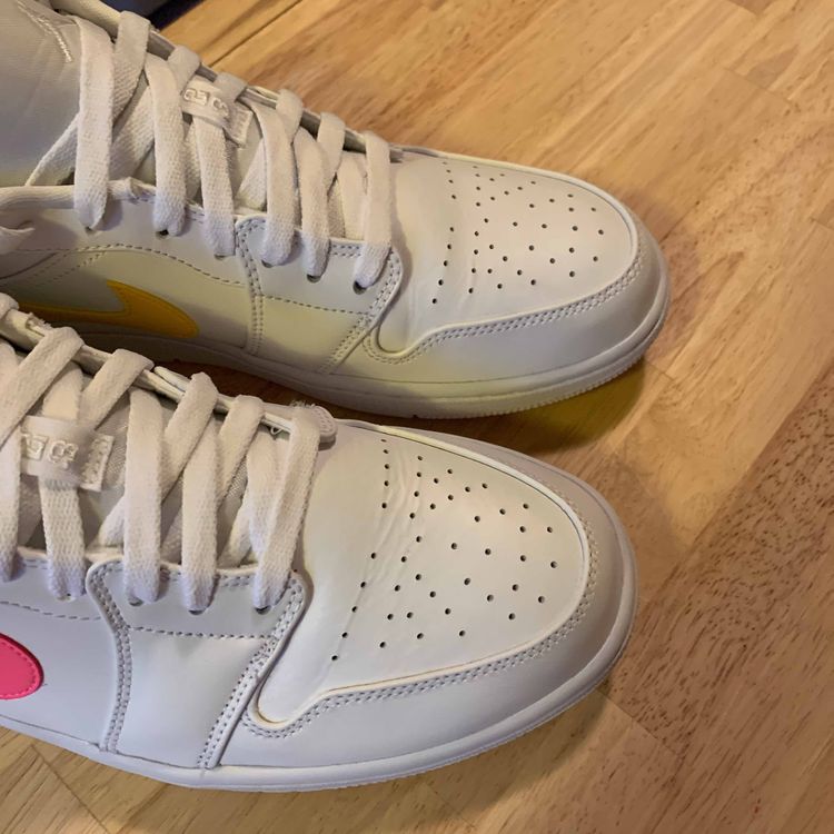 white jordans with multiple colors