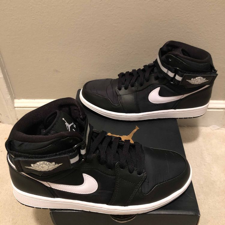 black jordans with a strap