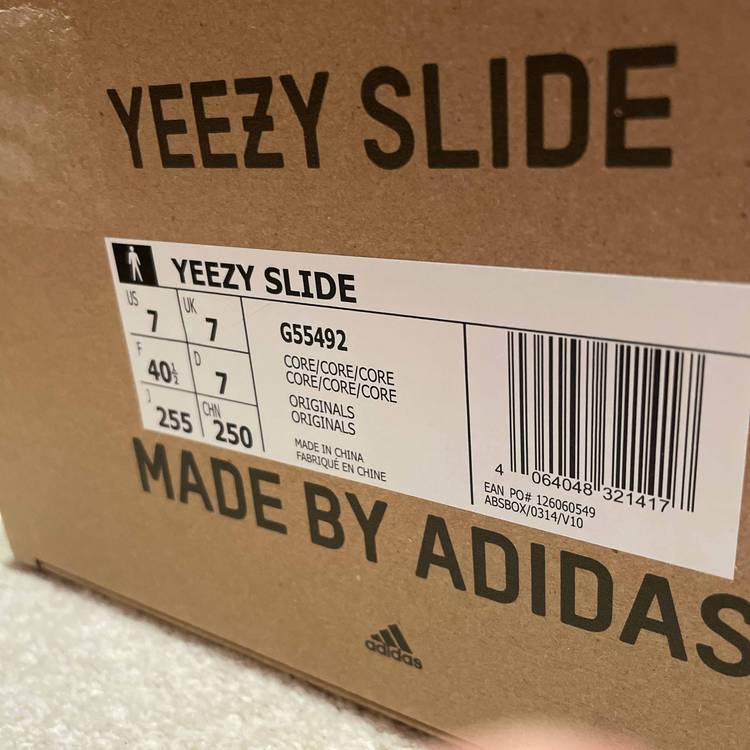 Yeezy Slides 'Core' - adidas - G55492 | GOAT