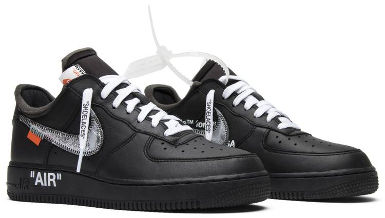 white and black air forces with orange lettering