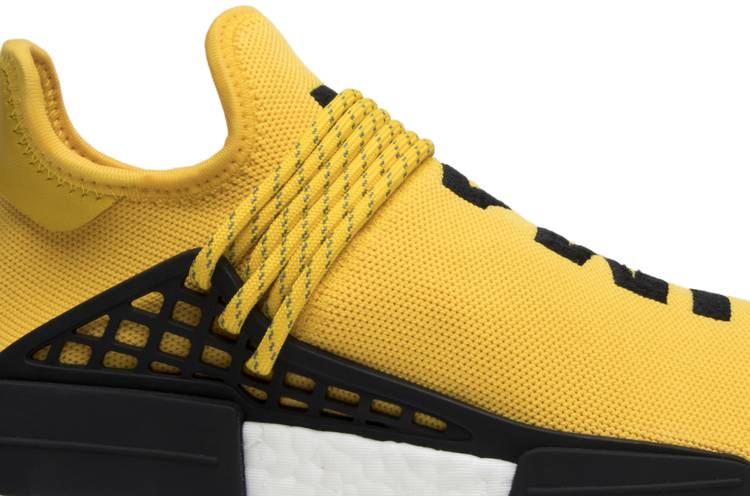 human race shoes black and yellow