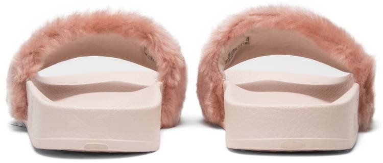 pink furry puma slides