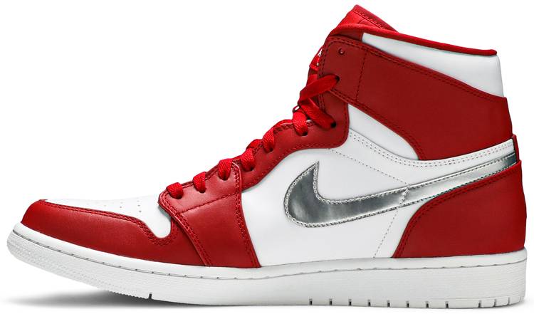 silver and red jordans