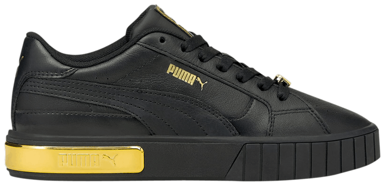 black and gold pumas 90s
