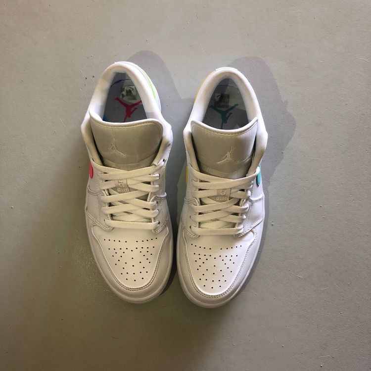 white jordans with multiple colors