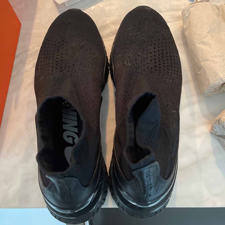 rise react flyknit triple black