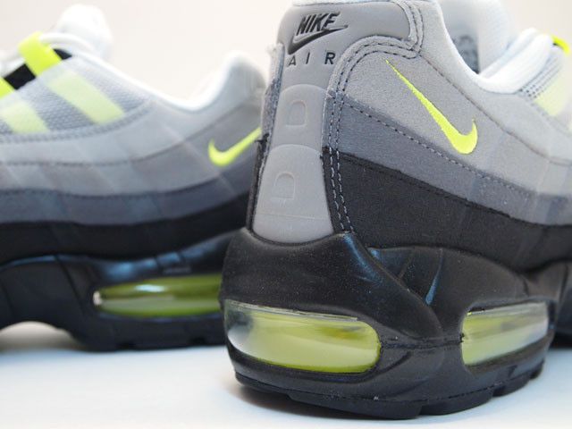 Neon yellow and grey nikes store