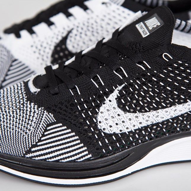 Nike flyknit racer black white sale clearance