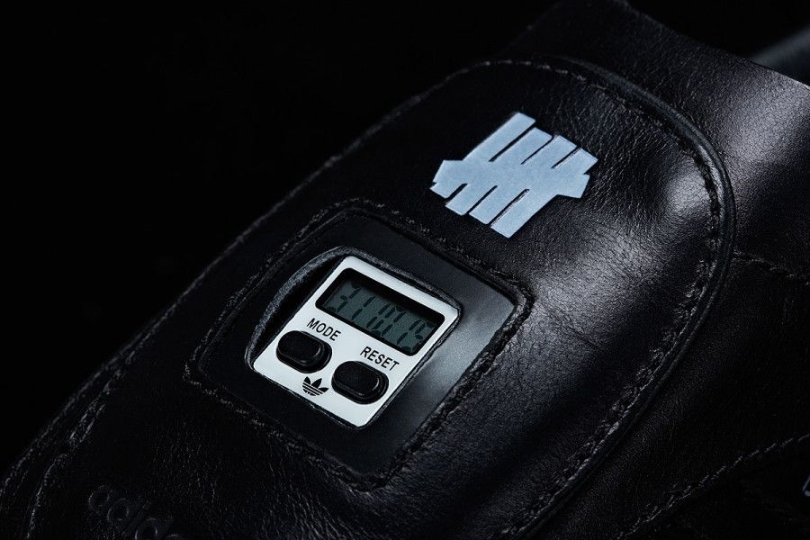 Buy Undefeated x Neighborhood x Micropacer Black M22693 GOAT