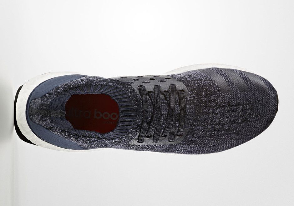 Ultra boost uncaged core black legend ink top
