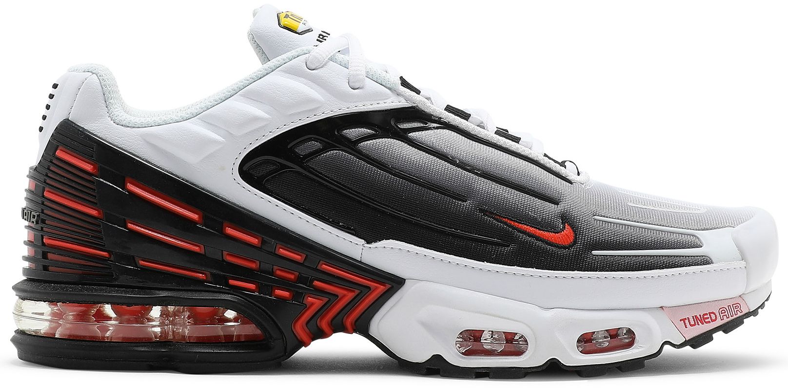 white and orange air max plus
