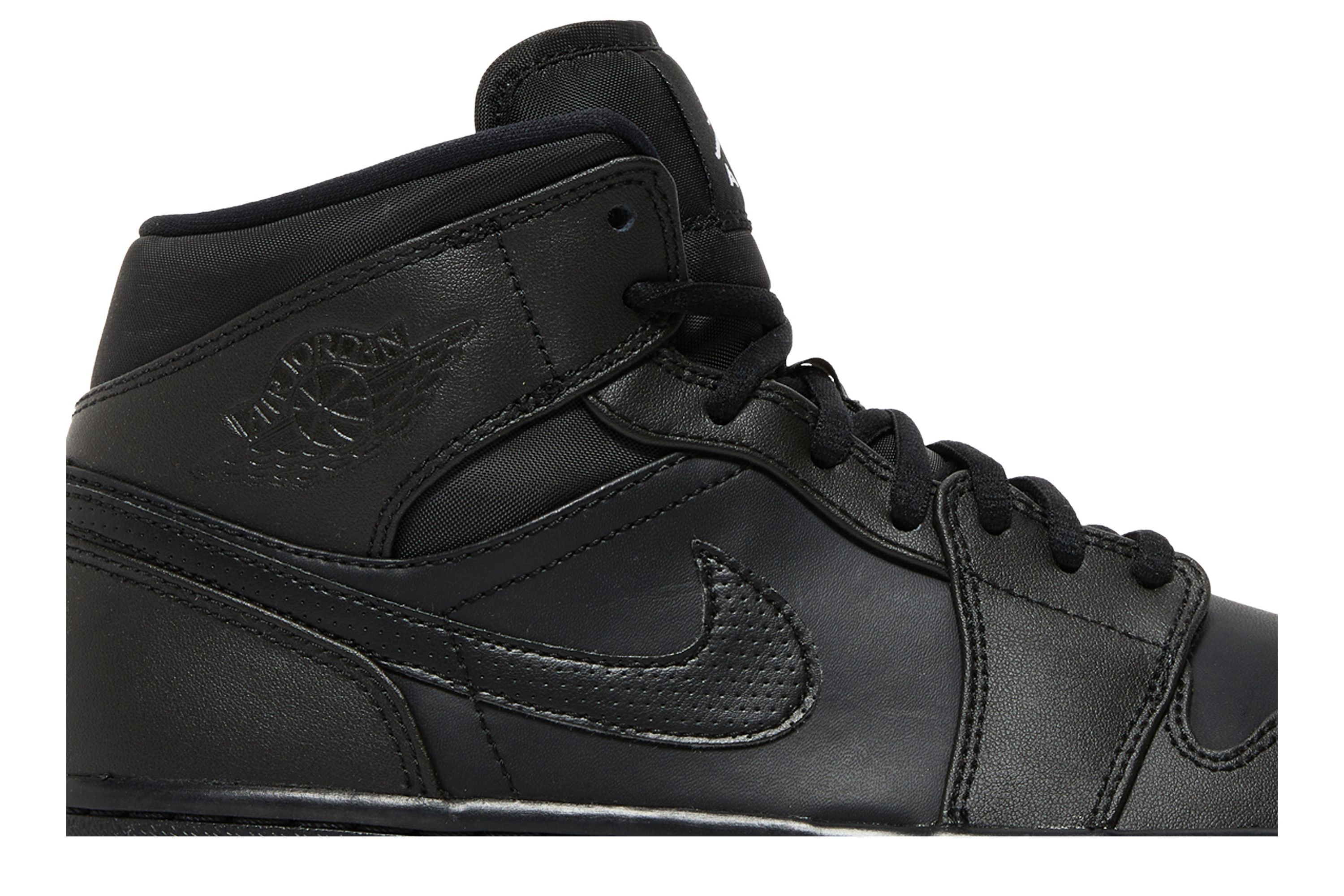 Jordan retro 1 mid black and white online