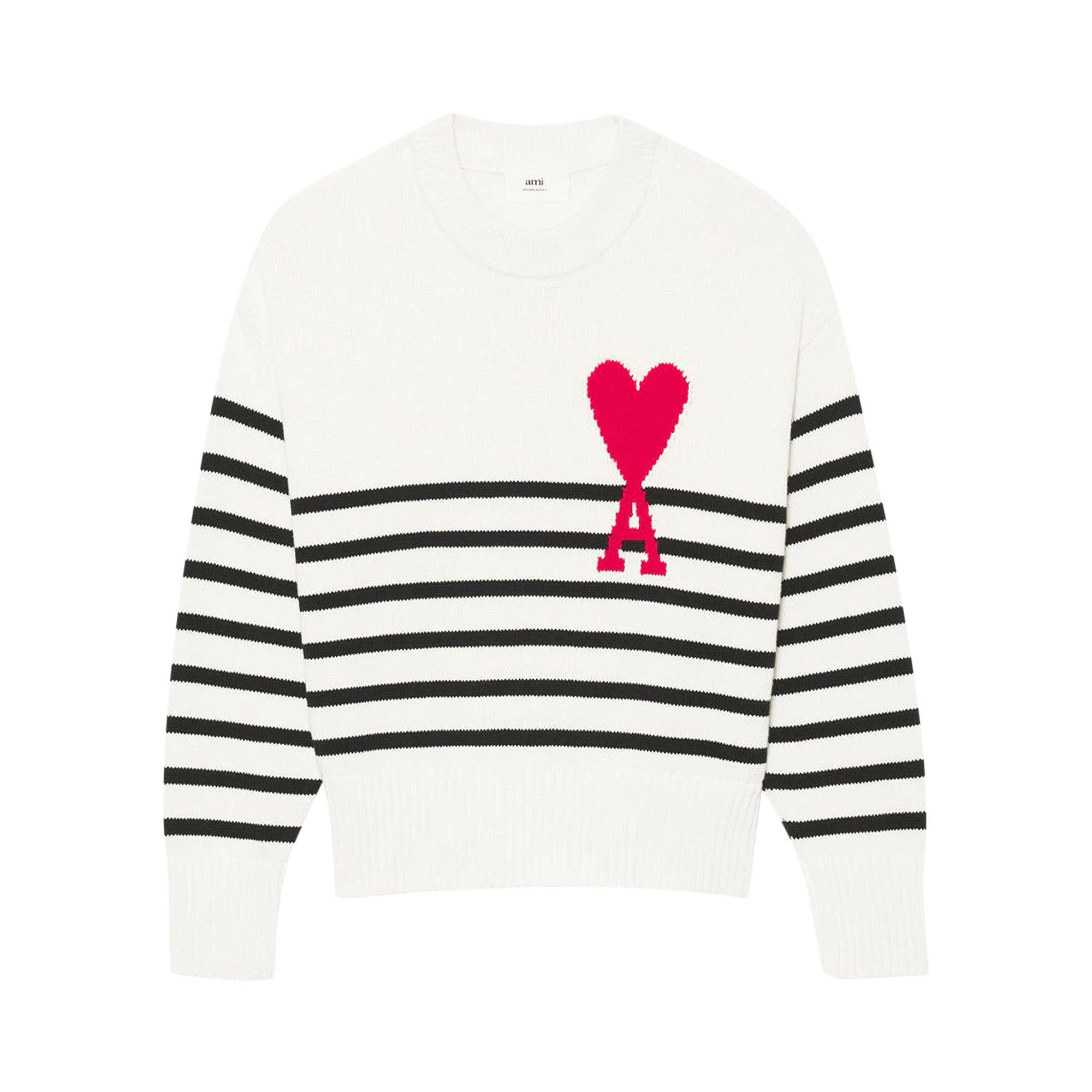 Red white top and black sweater