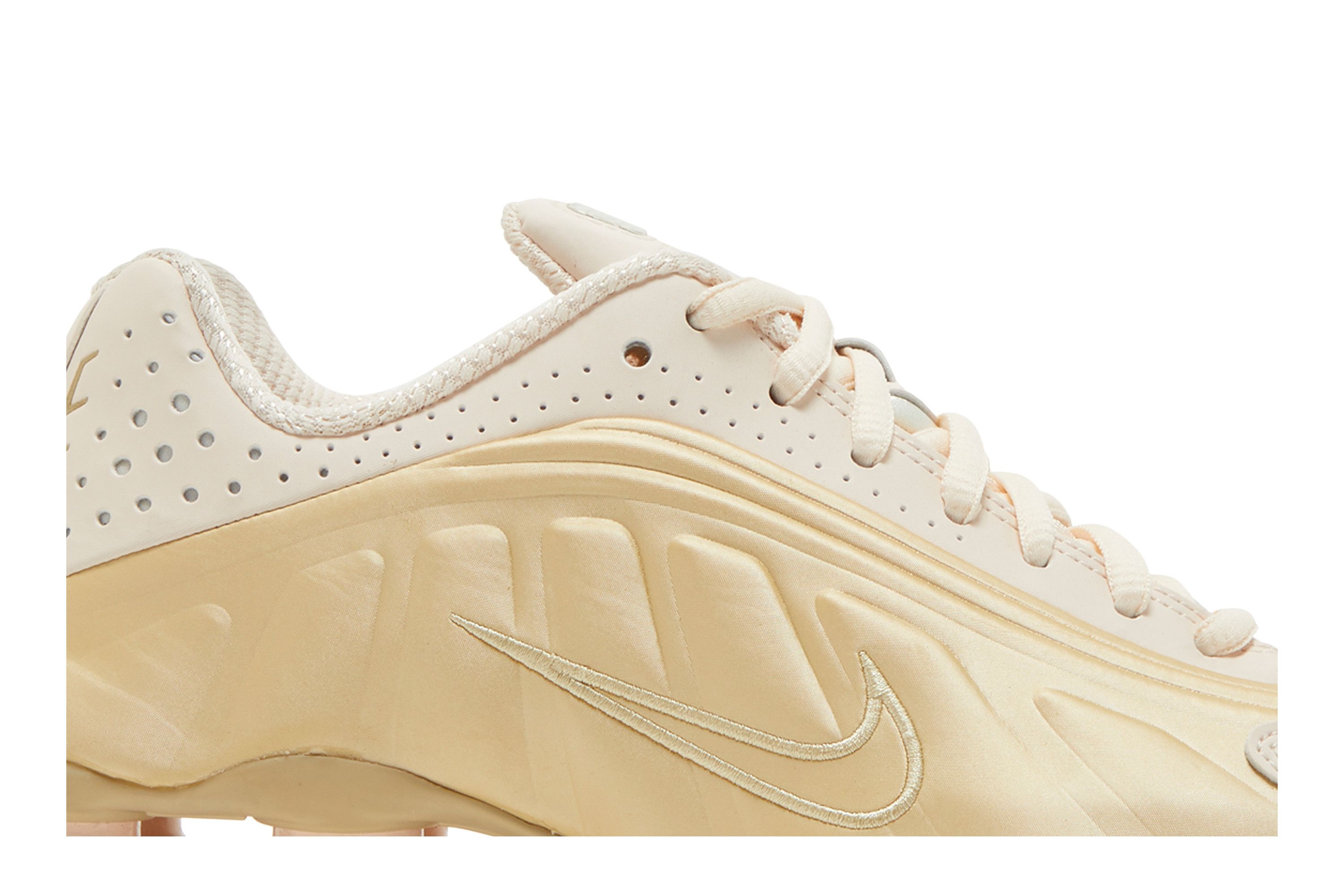 Gold nike shox womens best sale