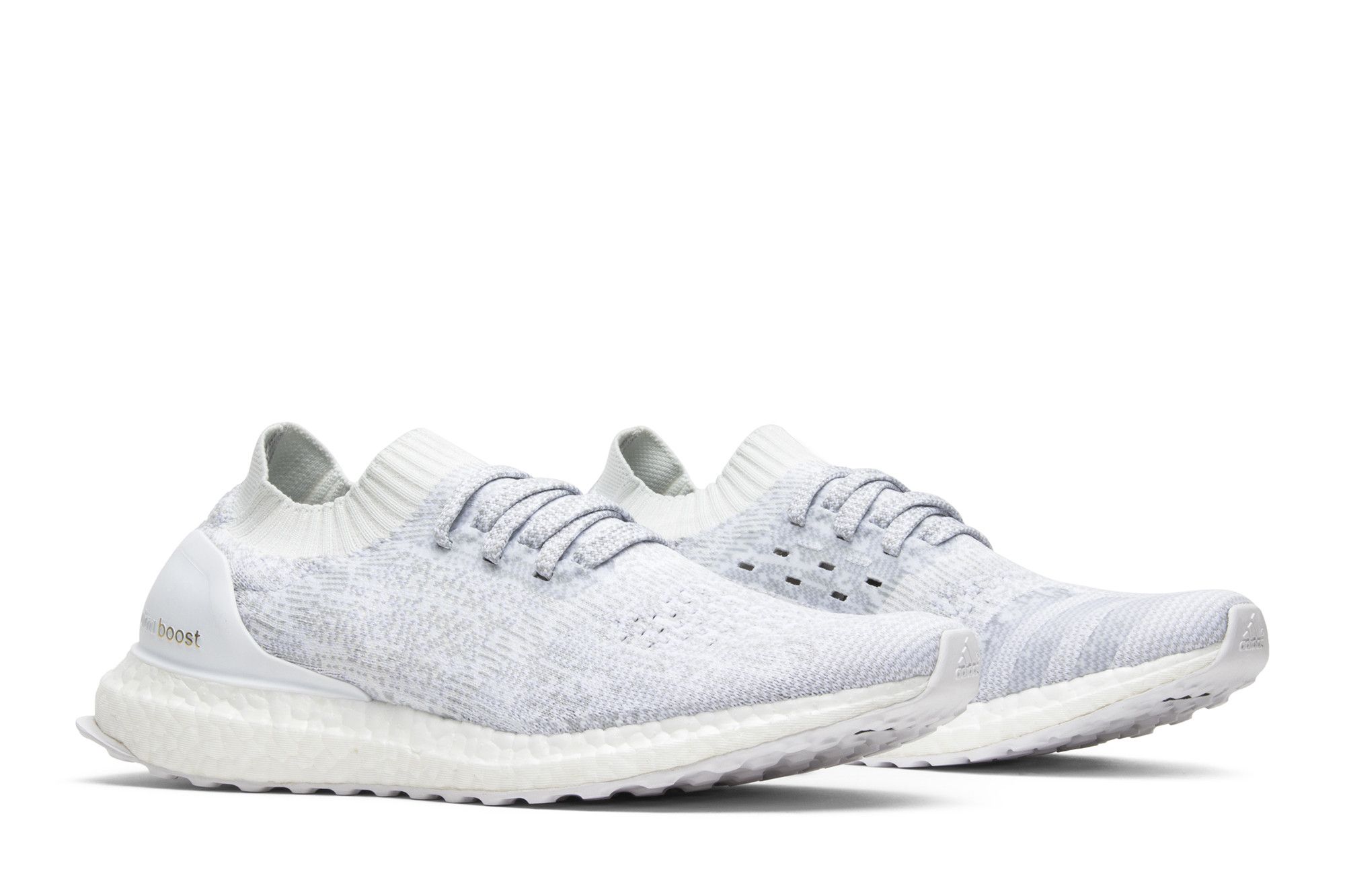 Adidas uncaged triple white store