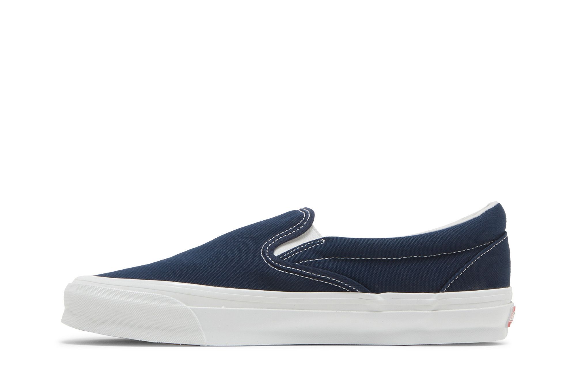 Vans classic navy slip on on sale