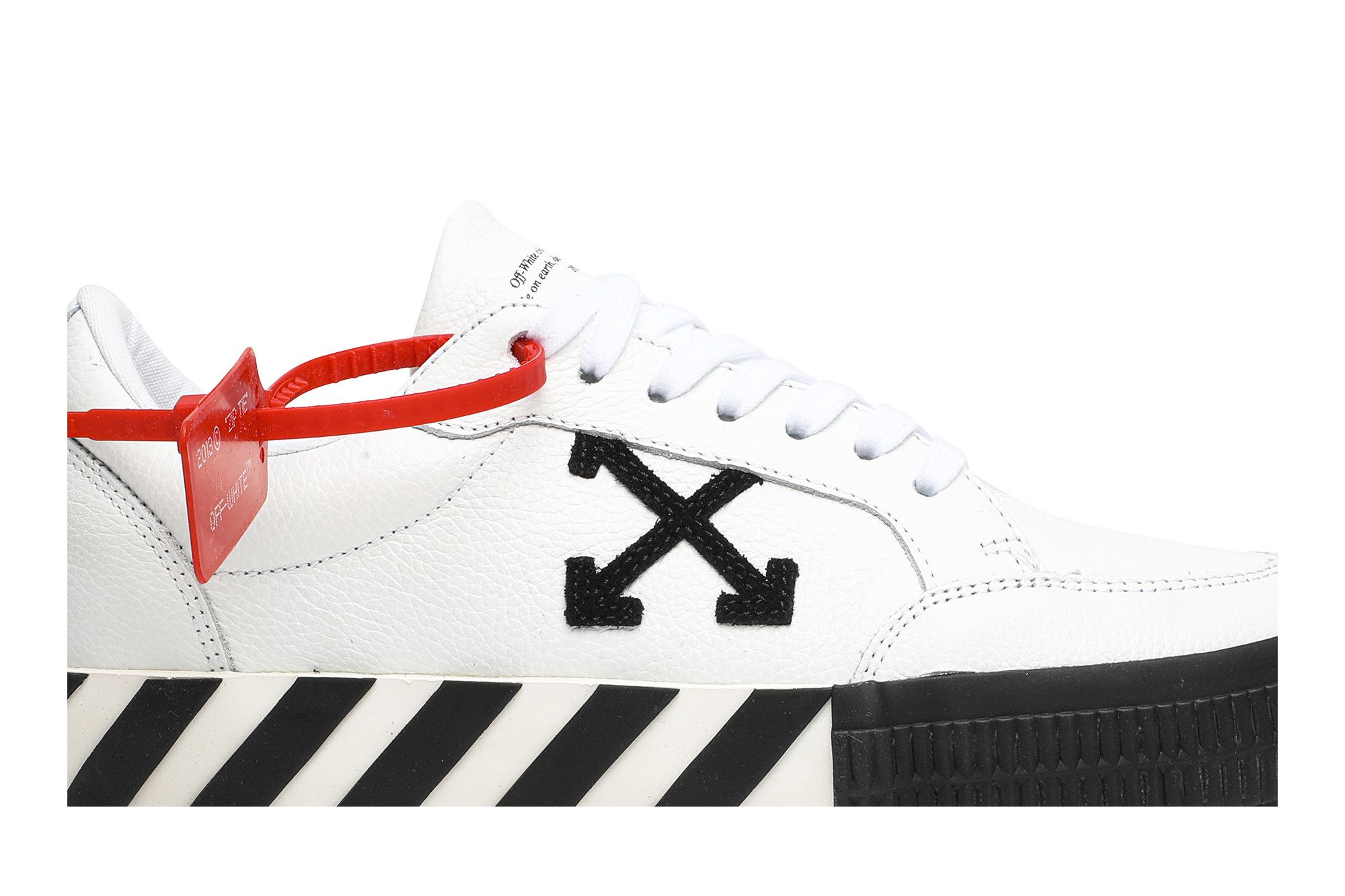 Off white vulcanised low top top
