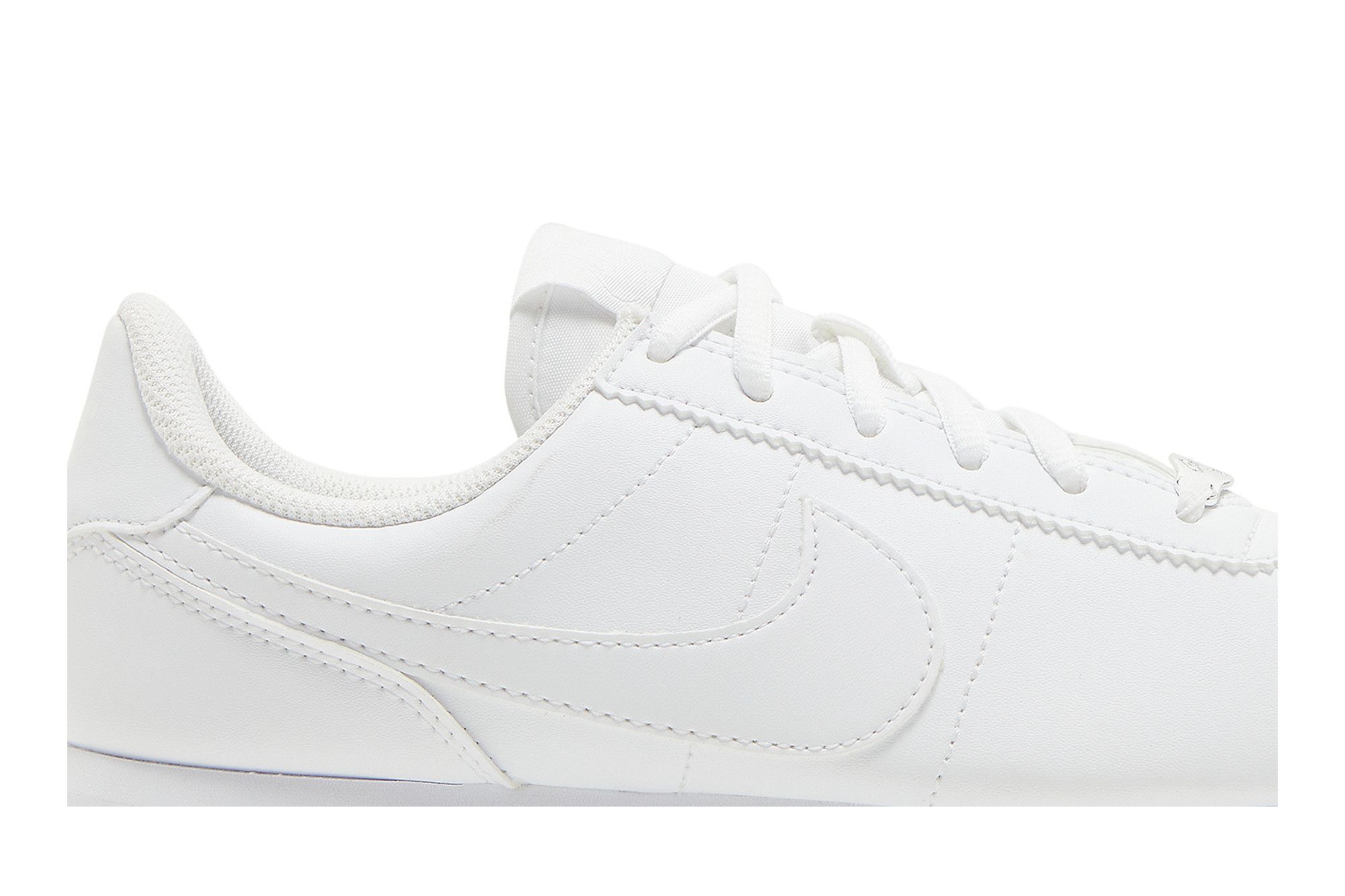 Nike cortez triple white price clearance