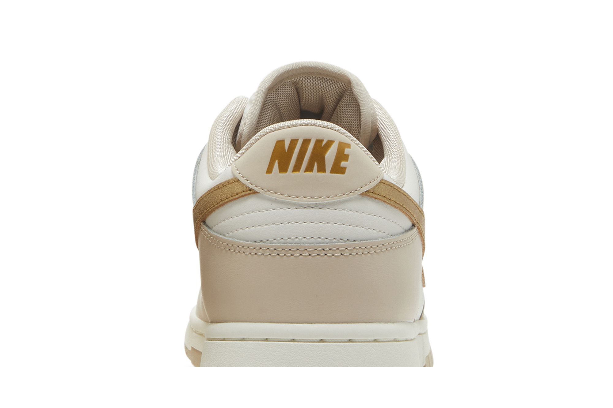 Nike women's shoes gold swoosh 2025