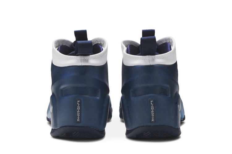 Black and Blue High-Top Sneakers
Flightposite 2 Nike Air Flightposite Metallic Sneakers - Blue | Editorialist main image 3